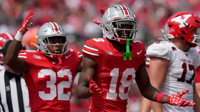 TreVeyon Hendeson (32) and Marvin Harrison Jr. (18)